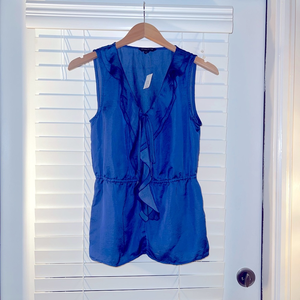 Blue, sleeveless blouse with ruffle detail
